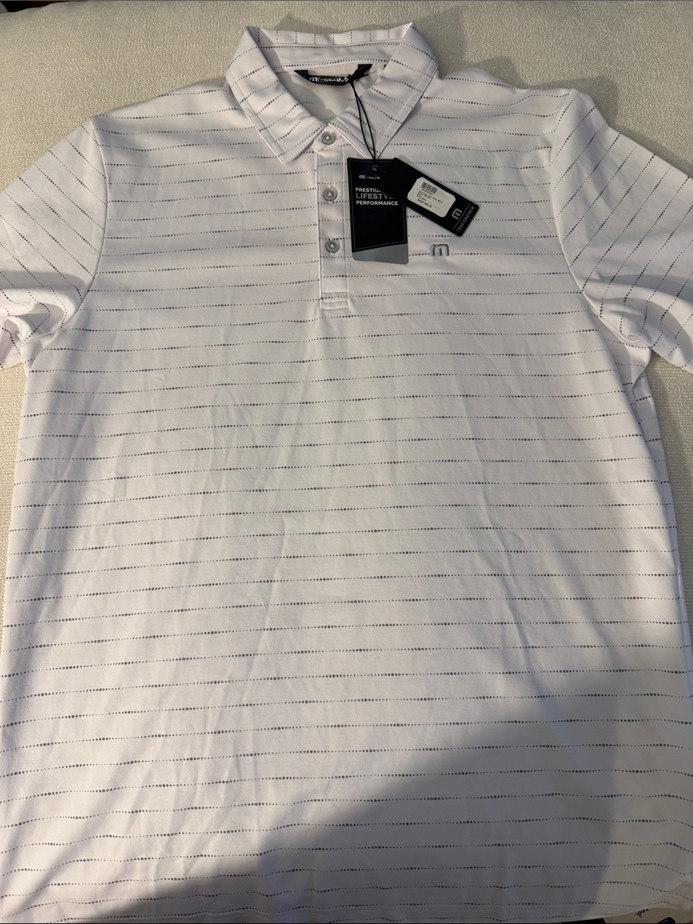 NWT Travis Mathew White Polo with Thin Navy Dotted Stripes